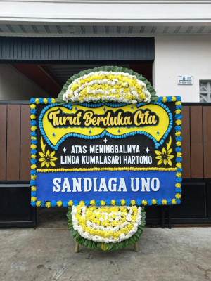 Papan Bunga Duka di Pangaribuan